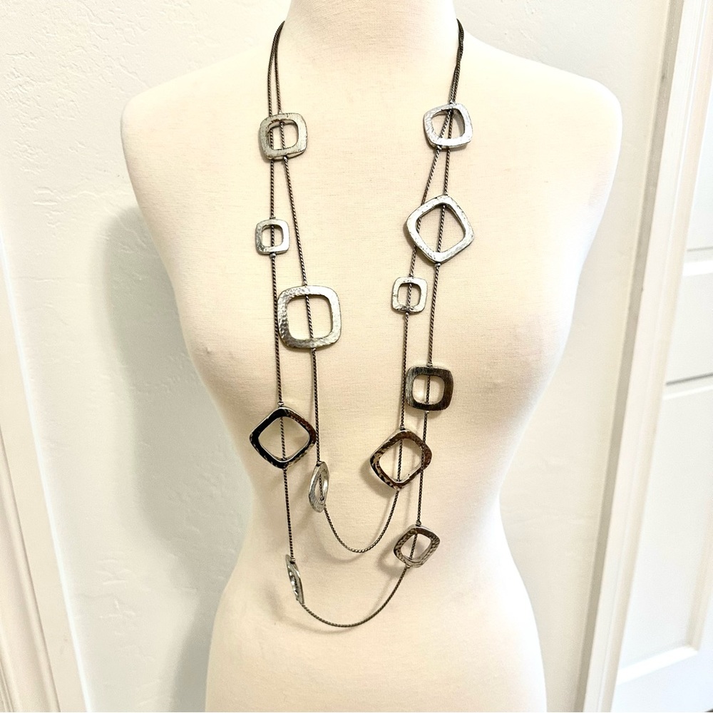 Long multi strand modern silver necklace